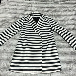 Black and white blazer. 100% polyester size small